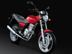 Gritty Adventure Steed: A Mz Motorcycle In Its Element Wallpaper