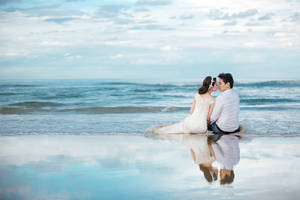 Groom And Bride In Beach Wallpaper