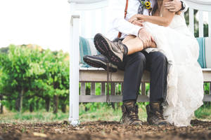 Groom And Bride In Bench Wallpaper