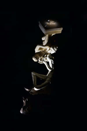 Grotesque Statue Wallpaper