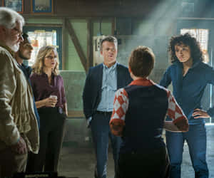 Group Discussionin Dramatic Setting Wallpaper