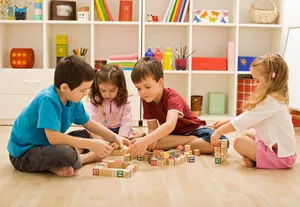 Group Of Happy Children Learning And Having Fun With Educational Games Wallpaper
