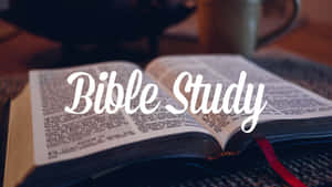 Group Of People Studying The Bible Together Wallpaper