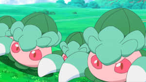 Group Of Pokémon Fomantis In Grassland Wallpaper