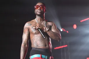 Gucci Mane Performingon Stage Wallpaper