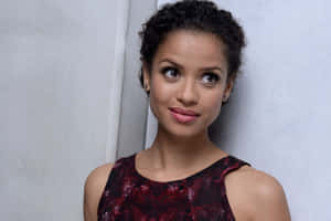 Gugu Mbatha-raw Posing Elegantly Wallpaper