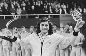 Guillermo Vilas Winning Moment At Masters Tournament Wallpaper