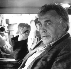 Gustav Scholz In Coat And Tie Wallpaper