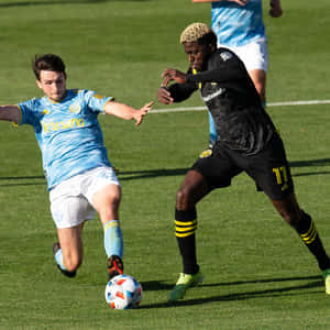 Gyasi Zardes And Leon Flach Wallpaper