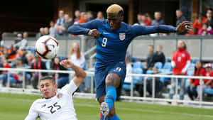 Gyasi Zardes And Marvin Loria Wallpaper