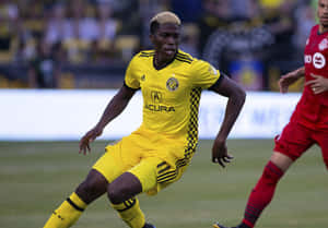 Gyasi Zardes Chases Ball With New York Red Bulls Wallpaper