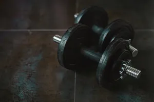 Gym Aesthetic Dumbbellson Floor Wallpaper