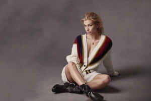 Hailey Baldwin Striking A Pose In A Casual Chic Outfit. Wallpaper