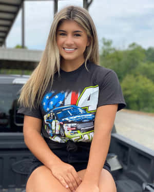 Hailie Deegan Smiling With Racing Tee Wallpaper