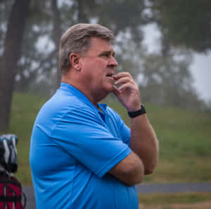 Hal Sutton With His Arms Crossed Wallpaper