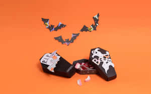 Halloween Coffinsand Bats Decoration Wallpaper