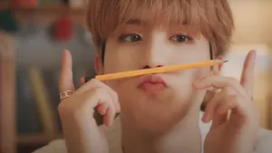 Han Stray Kids Playful Moment Wallpaper