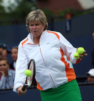 Hana Mandlikova Hitting A Ball With Her Racket Wallpaper