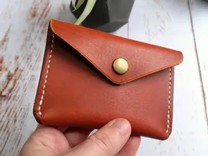 Handheld Leather Walletwith Snap Closure Wallpaper