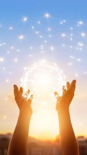 Hands Holding A Globe With A Network Of Lines Wallpaper