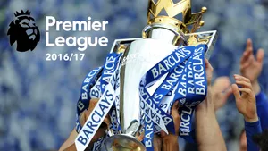 Hands Raising Premier League Trophy Wallpaper