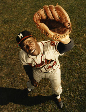 Hank Aaron Covering Eyes With Glove Wallpaper