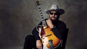 Hank Williams Jr Rocking Out At The Grand Ole Opry Wallpaper