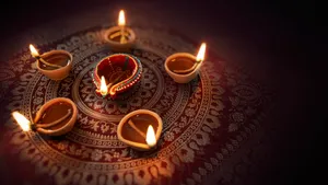 Happy Diwali Oil Lamps On Carpet Wallpaper