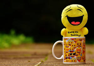 Happy Emoji In A Mug Wallpaper