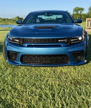 Happy Family And Their Modern Car Wallpaper