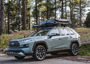Happy Family Enjoying A Road Trip In Their Spacious Car Wallpaper