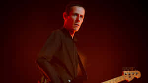 Hardfi Band Member Playing Bass Wallpaper