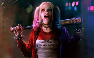 Harley Quinn Wielding Her Iconic Baseball Bat Wallpaper