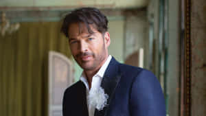 Harry Connick Jr. Striking A Pose On Stage Wallpaper