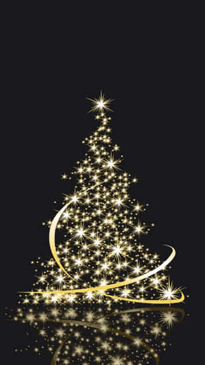 Hauntingly Beautiful Dark Christmas Scene With Illuminated Tree And Moon Wallpaper