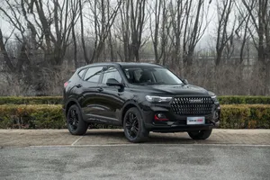 Haval's Stylish Suv Cruising Down The Road Wallpaper