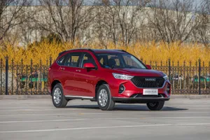 Haval Suv Driving Through A Beautiful Mountain Landscape Wallpaper
