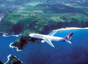 Hawaiian Airlines Plane Above Sublime Waters Wallpaper