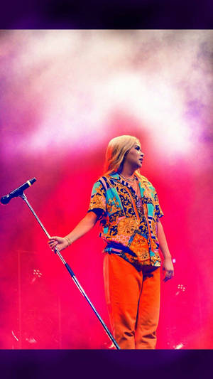 Hayley Kiyoko Performing At A Live Concert Wallpaper