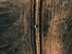 Hd Car On Dirt Aerial View Wallpaper