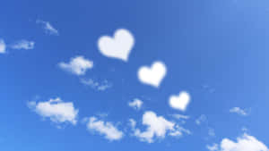 Heart Shaped Clouds In Sky Wallpaper