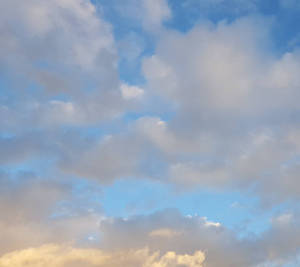 Heaven Is A Place On Earth - Soaring Clouds Over A Wondrous Landscape Wallpaper