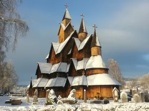 Heddal Stave Church Covered In Snow Wallpaper
