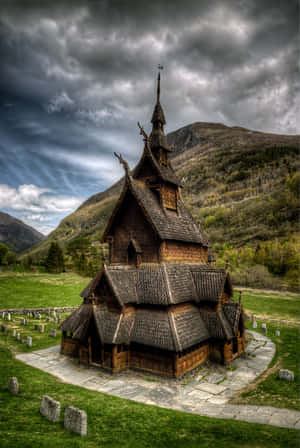 Heddal Stave Church Under Gray Clouds Wallpaper