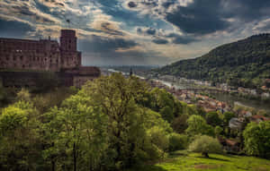 Heidelberg Castle Under Aesthetic Clouds Wallpaper
