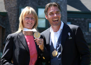 Helena Sukova And Michael Stich Proudly Displaying Their Medals Wallpaper