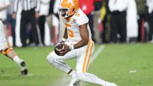 Hendon Hooker Tennessee Quarterback Action Shot Wallpaper