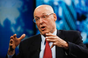 Henry Paulson Delivering Speech On A Show Wallpaper