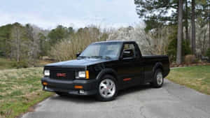 High Definition Wallpaper Of A Glossy Gmc Syclone Wallpaper