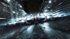 High-octane Racing Car Drifting In Action Wallpaper